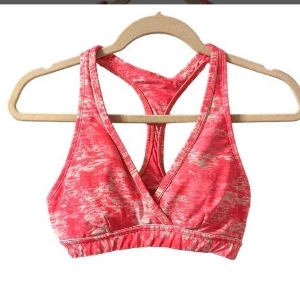Athleta Racerback sport bra. Orange/pink color with/white padded Size S